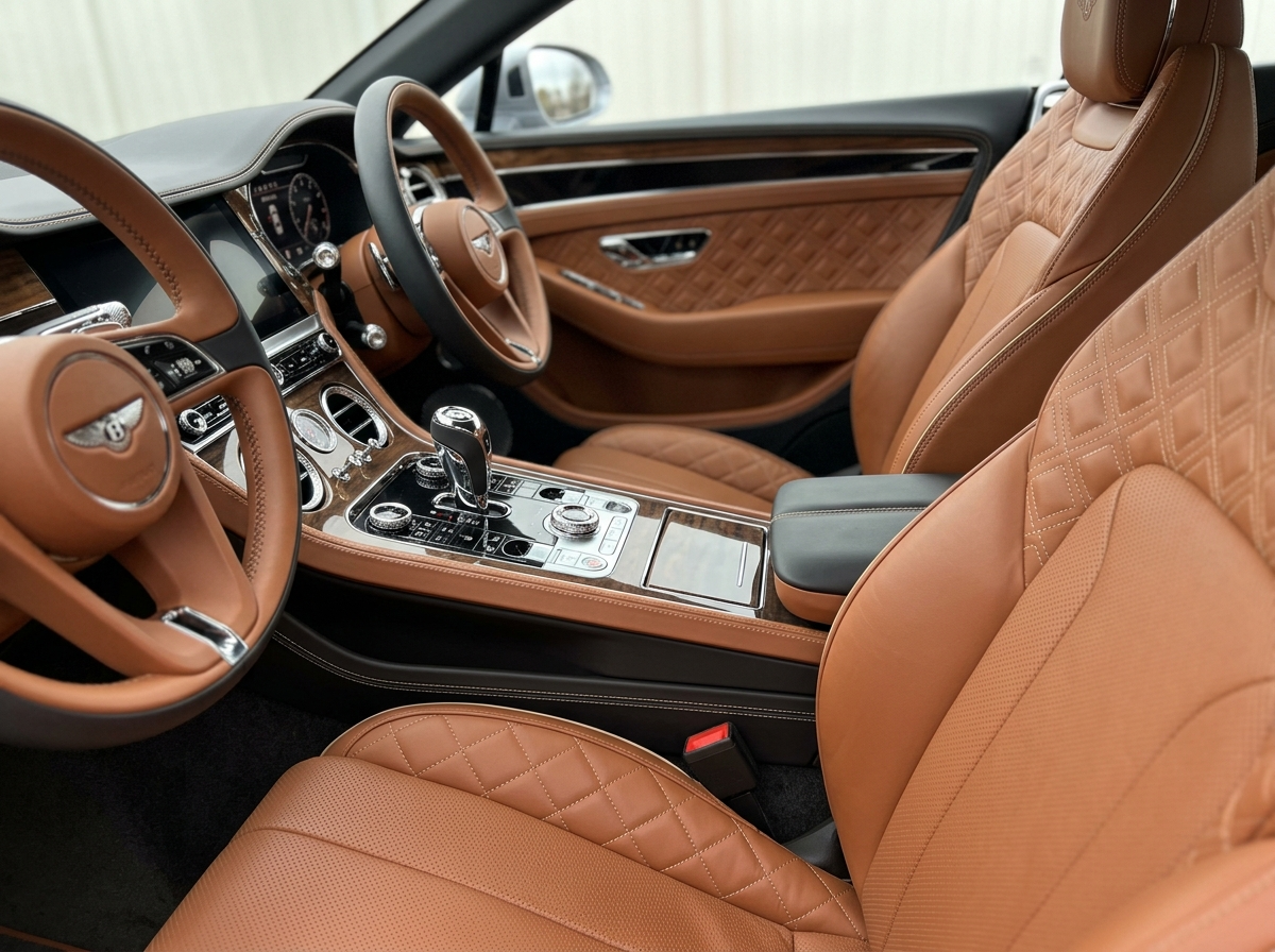2022 Bentley Continental GT interior quilted leather seats and diamond knurled controls